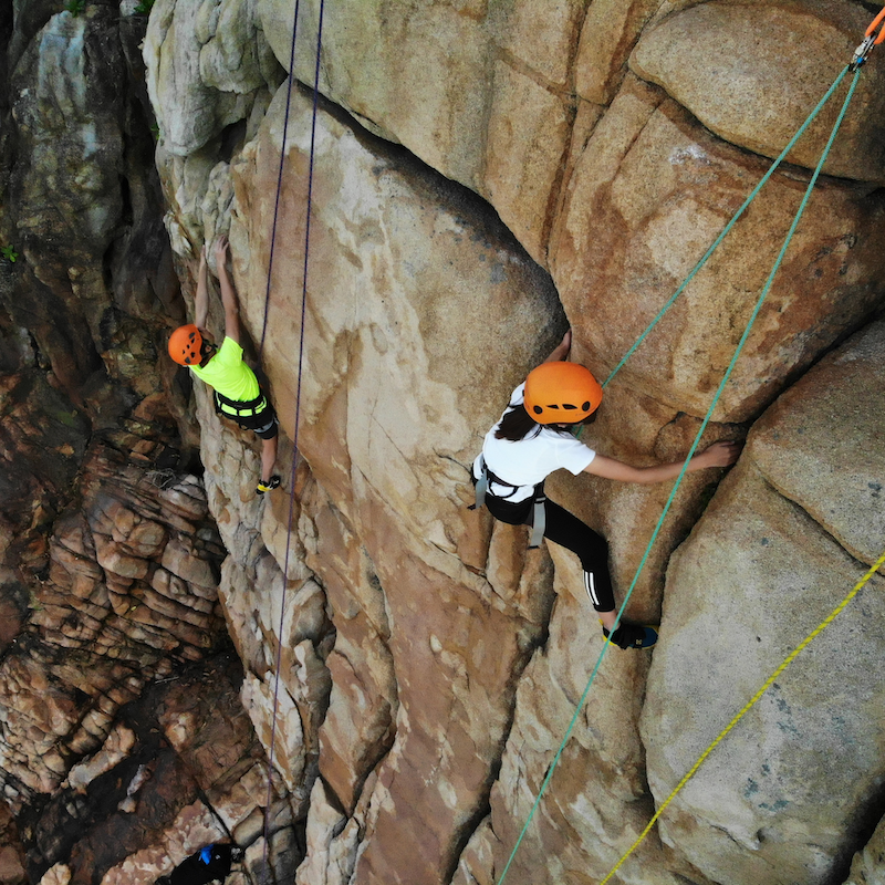 MT-NAV-Web-12 Navigators climbing on a sea cliff